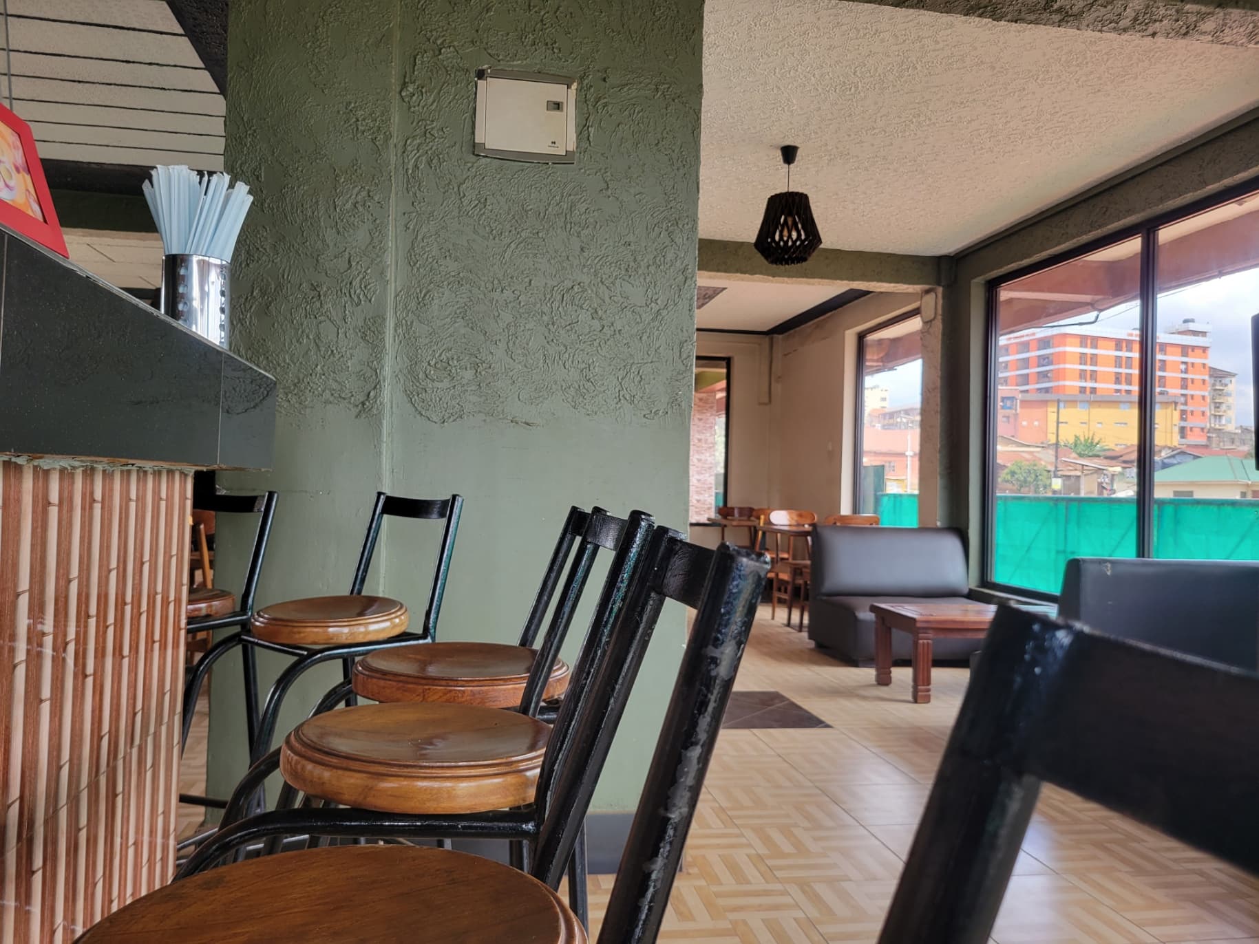 Lounge-style bar interior at Neptune Plaza
